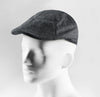 (Anthrazit) Schiebermütze Herren Tweed Flat Cap – Seitenansicht auf Mannequin